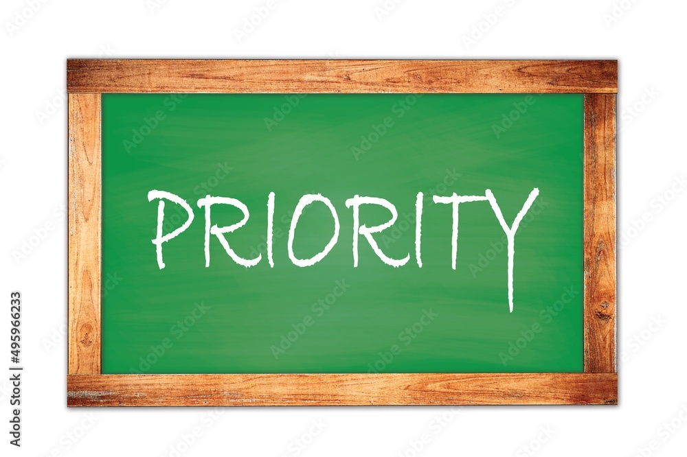 PRIORITY text written on green school board. PRIORITY text written on green school board.