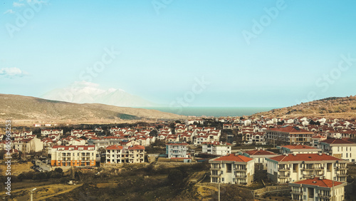 Gökçeada-Imbros Island Turkey city center view with buildings. View of Samothrace, the greek island across from the center of Gökçeada