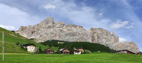 Val Badia, Dolomiti (Italy). Antichi masi tradizionali a San Cassiano (Bz). Sullo sfondo le Conturines.   photo