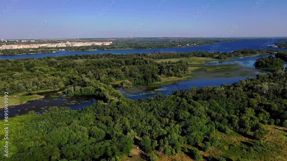 Beautiful landscape in the aerial view of the drone. Forest forest and calm calm river. Bold white clouds, mirroring the surface of the water.Aerial view of river in forest. Beautiful ecosystem flora Beautiful landscape in the aerial view of the drone. Forest forest and calm calm river. Bold white clouds, mirroring the surface of the water.Aerial view of river in forest. Beautiful ecosystem flora