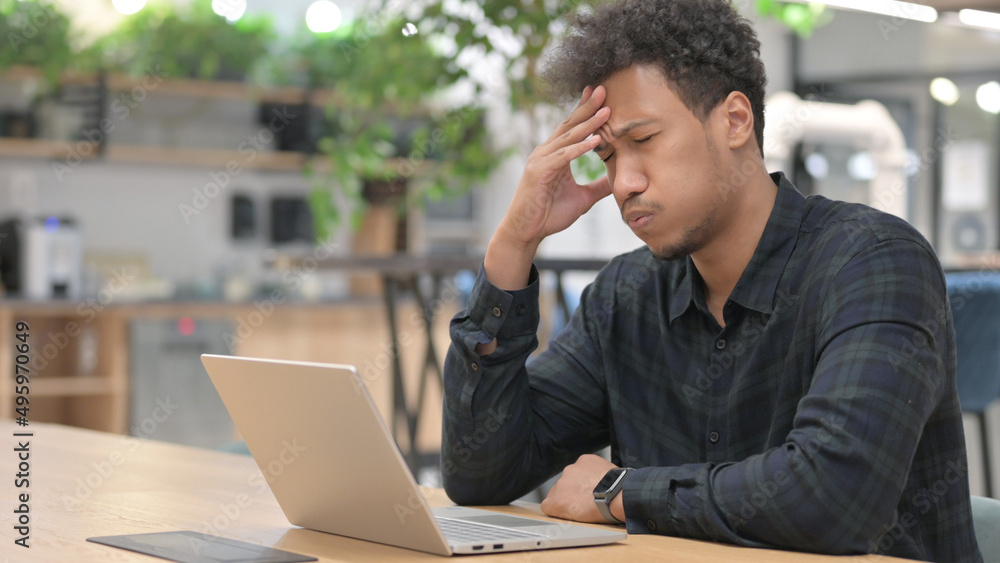 African American Man with Laptop having Headache African American Man with Laptop having Headache