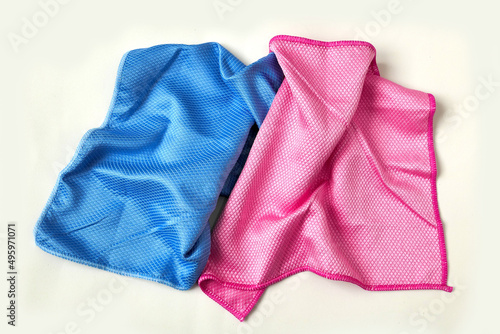 colorful microfiber cleaning cloths used for household cleaning, close-up microfiber cloths on a white background,