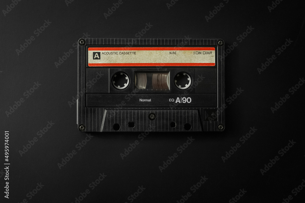Fototapeta premium Audio cassette on black background, Vintage poster