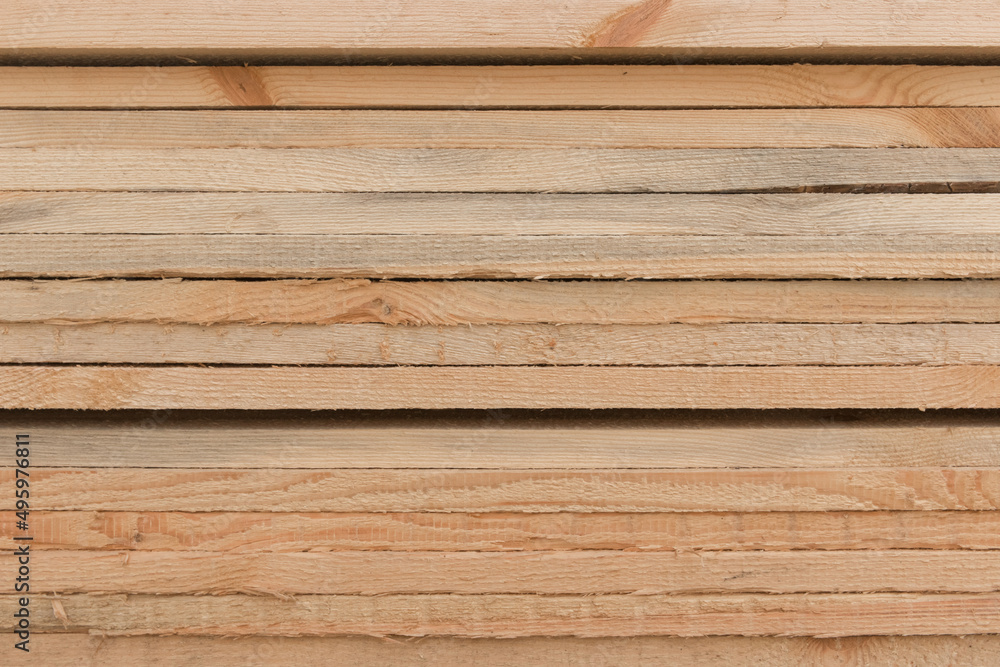 Fototapeta premium Wood stack storage of timber materials and lumber pile industry