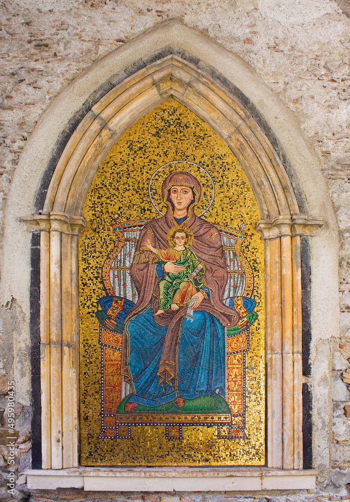 Mosaic with the Virgin and Child on Clock Tower at IX Aprile Square in Taormina, Sicily, Italy 