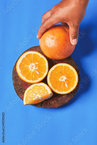 citrus slices, orange, grapefruit, lemon on blue background- Fresh fruits. Natural fruits.