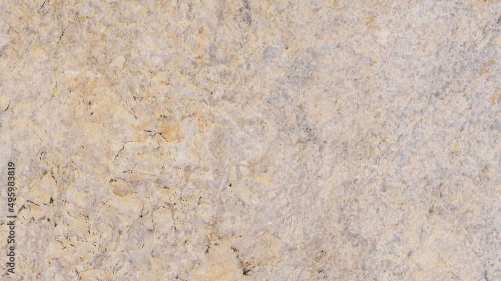 Beige stone texture with spots and cracks. Cracked vintage wall background Beige stone texture with spots and cracks. Cracked vintage wall background