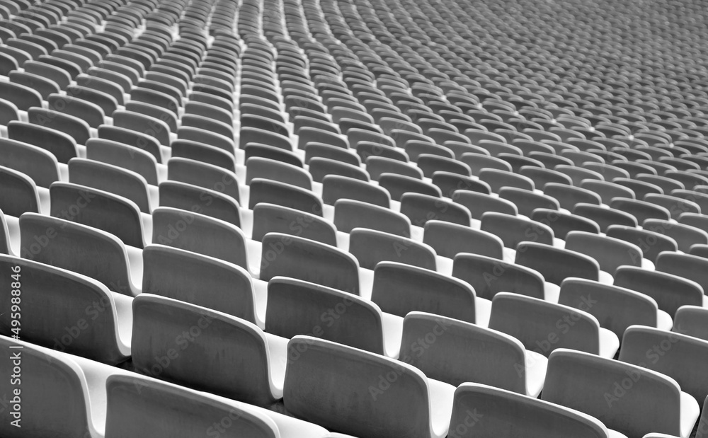 Fototapeta premium Series of many grey bleachers in the arena