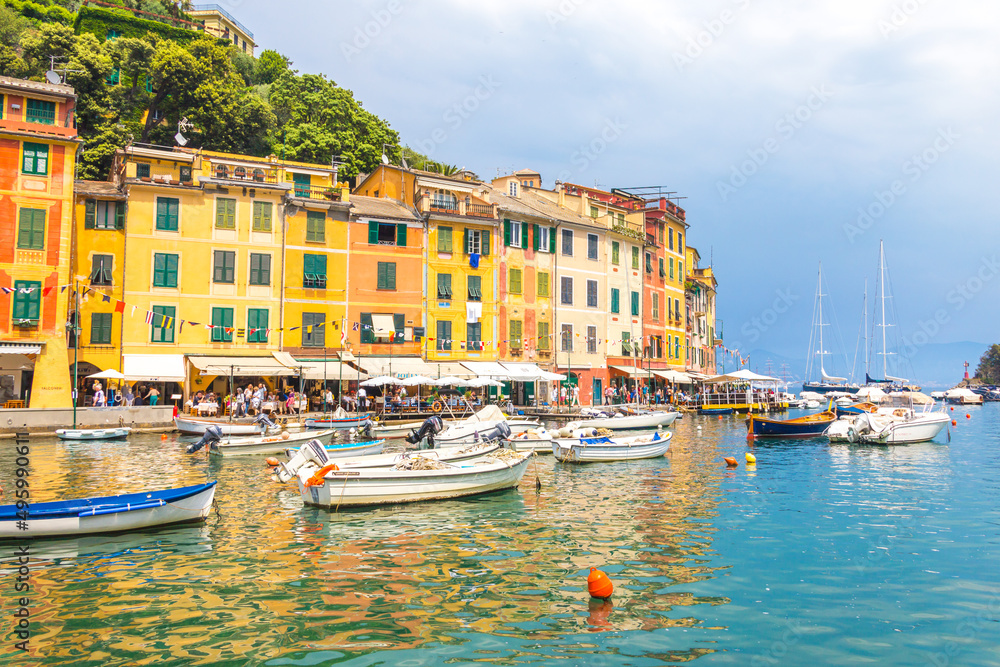 Portofino with colorful houses and villas in little bay harbor. Liguria, Italy, Europe