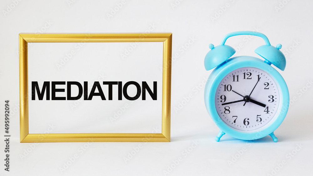 intermediary word - isolated text in golden frame and white background with clock