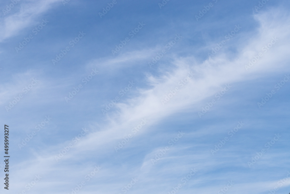Blue Sky with White Cirrus Clouds in Diagonal Line