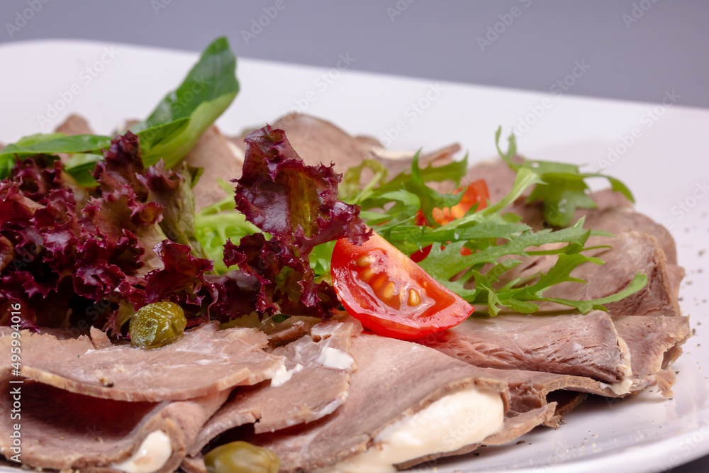 Vitello tonato is a traditional Italian dish of veal with tuna sauce