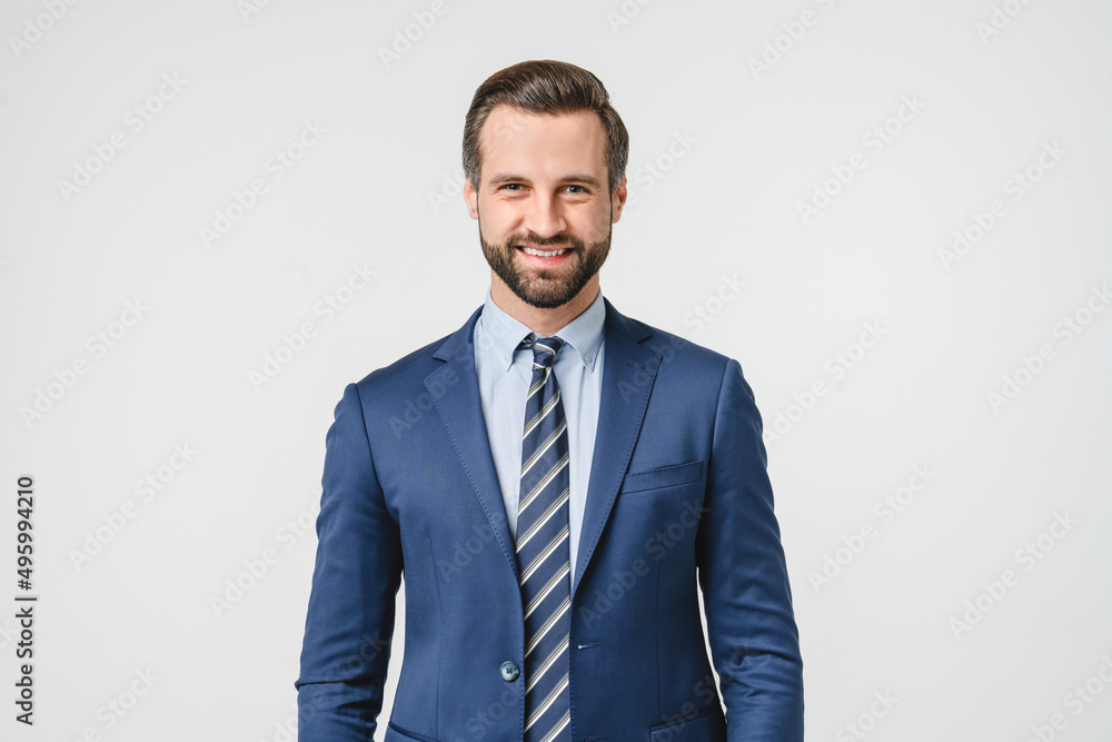 Portrait of handsome caucasian man in formal suit looking at camera smiling with toothy smile isolated in white background. Confident businessman ceo boss freelancer manager Portrait of handsome caucasian man in formal suit looking at camera smiling with toothy smile isolated in white background. Confident businessman ceo boss freelancer manager