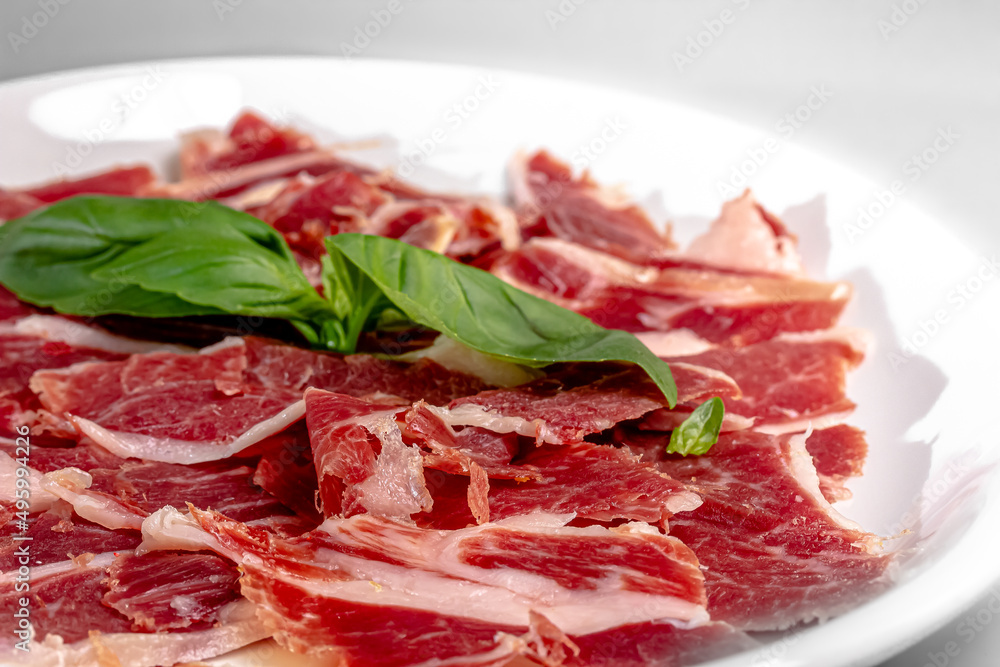 Ham sliced with parmesan, lime and arugula Ham sliced with parmesan, lime and arugula