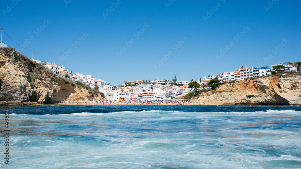 Panoramic view of Carvoeiro from a boat. Carvoeiro is a picturesque village on the coast of Algarve. Portugal