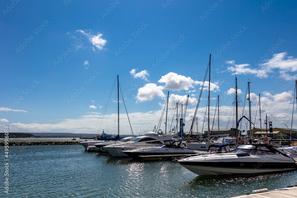 Naklejka premium Boats moored in beautiful Poole Harbour, on a hot summer`s day