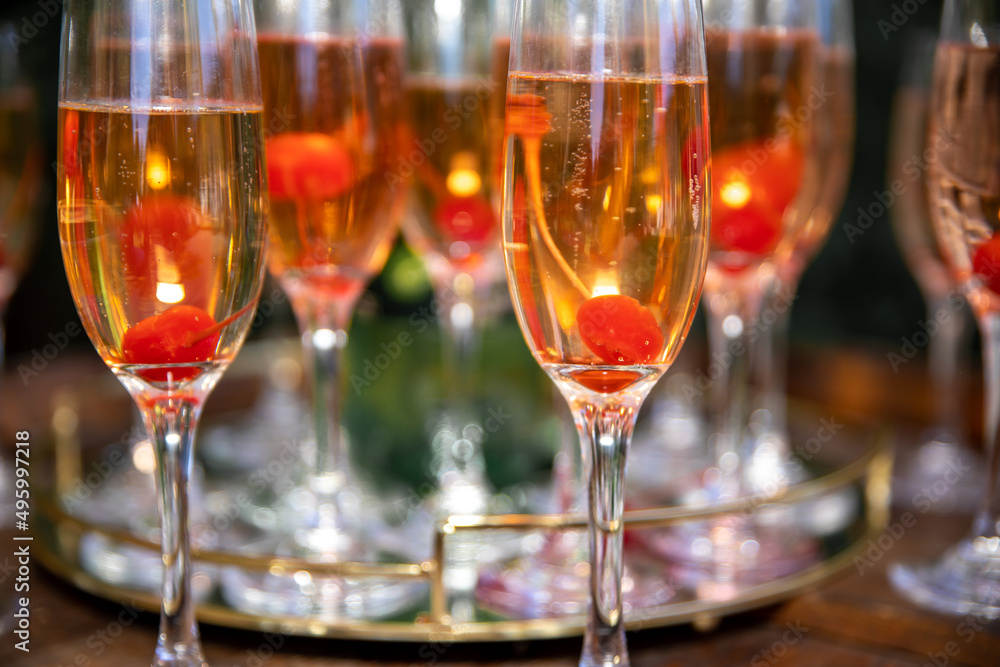 Non-alcoholic drinks served with a cherry inside the clear class Non-alcoholic drinks served with a cherry inside the clear class