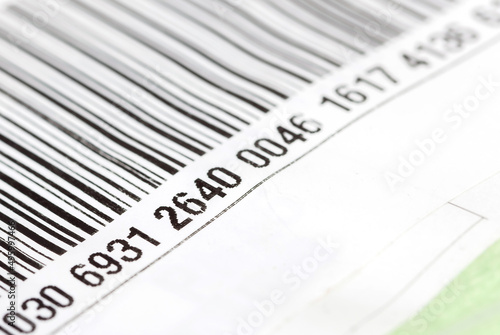 Part of a barcode label, numbers on a product package, object detail, macro, extreme closeup, nobody, shallow dof. Retail, product origin, number, indentification, commerce, economy, business concept
