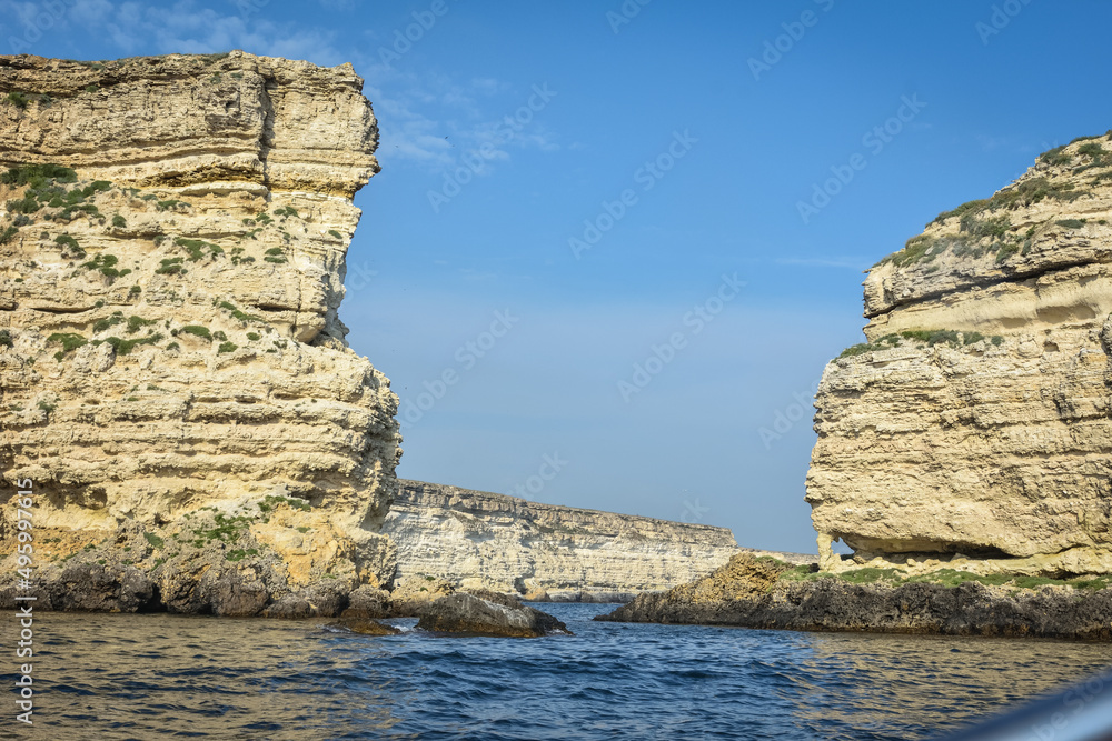 rocky shore of Black Sea, landscape with rocks on seashore, rocks sticking out of sea rocky shore of Black Sea, landscape with rocks on seashore, rocks sticking out of sea