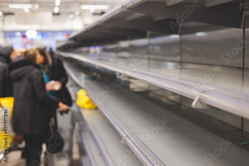 View of empty supermarket shelves, grocery store work stoppage closes, sanctions and embargo, panic buying with supplies and goods shortage, food crisis and deficit concept
