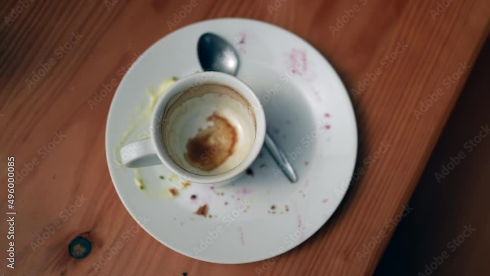 Top view of empty cup of coffee leftovers Top view of empty cup of coffee leftovers