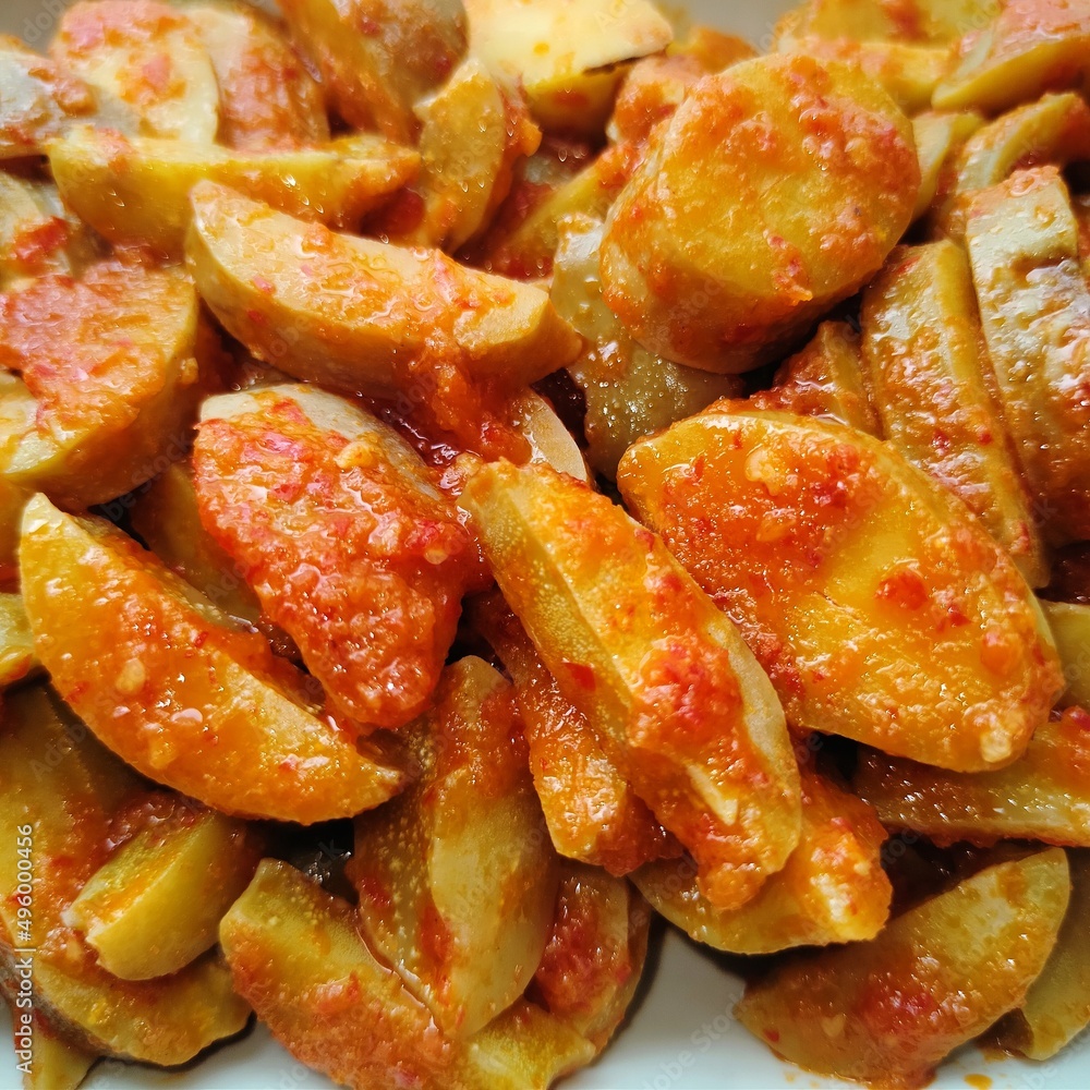 Spicy jengkol balado or jengkol stew, made from jengkol seeds or dogfruit with Indonesian spices, one of the popular dishes from Indonesia
Spicy jengkol balado or jengkol stew, made from jengkol seeds or dogfruit with Indonesian spices, one of the popular dishes from Indonesia