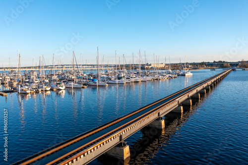 Aerial View of a railroad Bridge and a marina in New Bern North Carolina