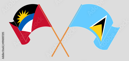 Crossed and waving flags of Antigua and Barbuda and Saint Lucia