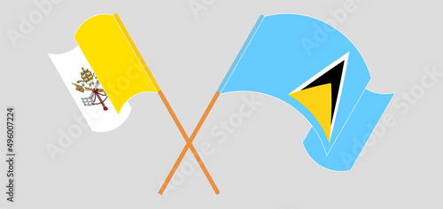 Crossed and waving flags of Vatican and Saint Lucia