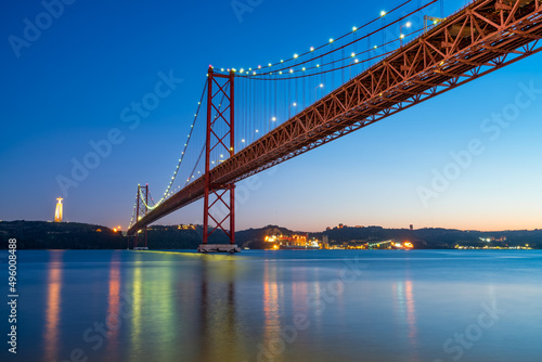 The 25 de Abril bridge over the Tajo River with Cristo Rei or Christ the King in the background. Lisbon. Portugal © Pawel Pajor