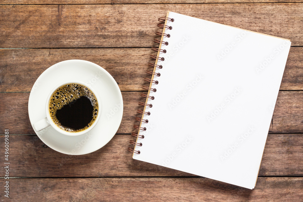 Blank notebook on the coffee table Blank notebook on the coffee table
