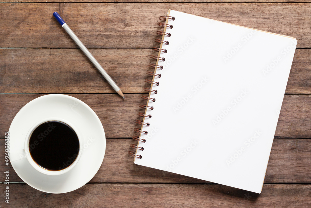 Blank notebook with pencil on the table old wood.