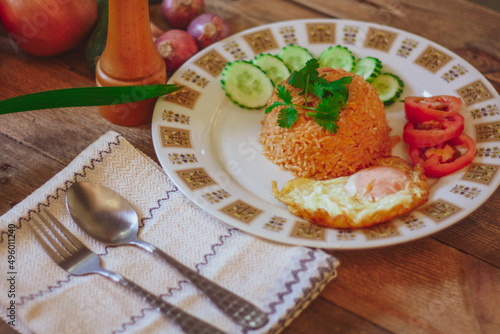Wallpaper Mural Fried Rice with Fried Egg Put on the wooden table and the tomatoes, cucumbers, garlic, shallots Torontodigital.ca