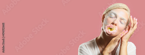 Beautiful young woman with ...