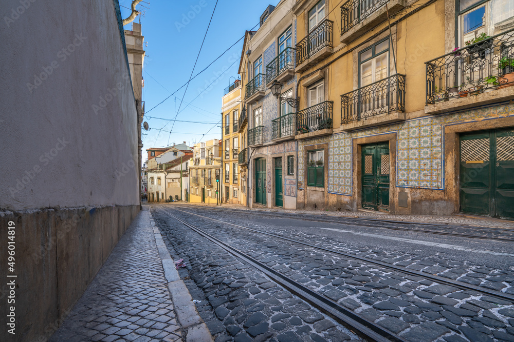 Tram rail tracks at on the old stone street of Lisbon. Portugal