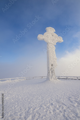 A snow-covered cross on the top of Tarnica in the Bieszczady Mountains
 photo