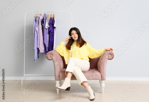 Young Asian woman sitting i...