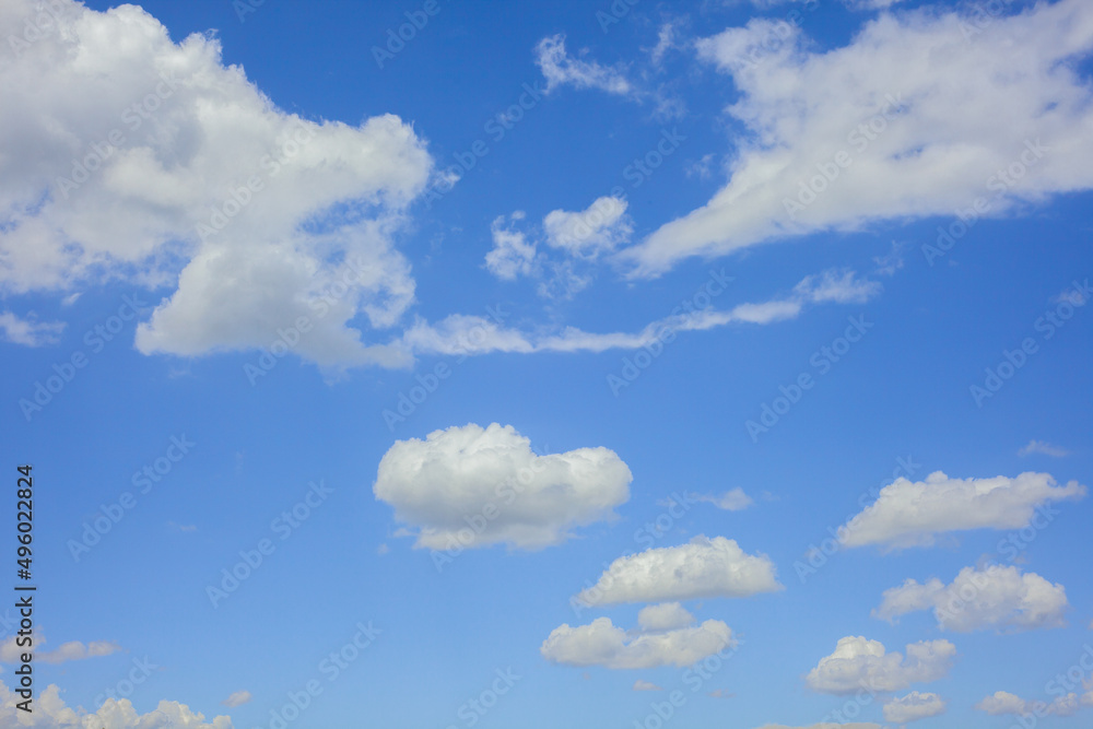 blue sky background with small clouds . blue sky background with small clouds .