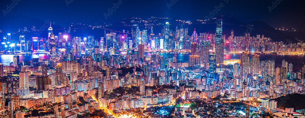 panorama epic view of Hong Kong Night, from Kowloon to Hong Kong Island. metropolis in Asia panorama epic view of Hong Kong Night, from Kowloon to Hong Kong Island. metropolis in Asia