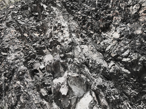 black stone wall for graphic design or wallpaper.