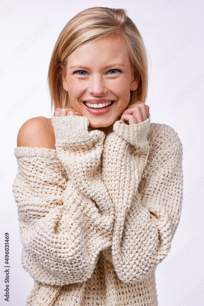 Happy in wool. Studio portrait of a beautiful young woman isolated on white. Happy in wool. Studio portrait of a beautiful young woman isolated on white.