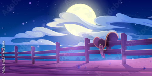 Western country landscape with horse saddle on wooden fence at night. Vector cartoon illustration of wild west desert, american ranch with cowboy saddle, paddock wood fence and full moon in sky