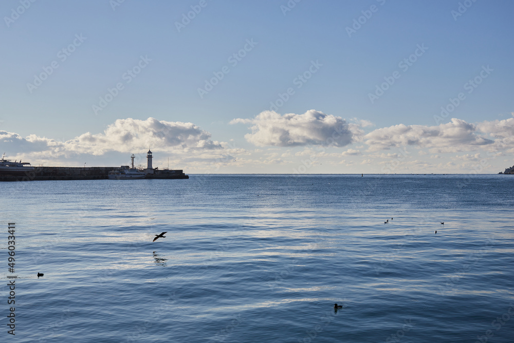 Sea and lighthouse in the city of Yalta. Black Sea. Front view.
