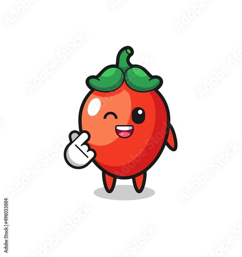 chili pepper character doing Korean finger heart