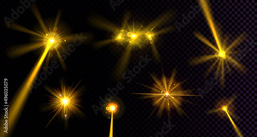 Lens flares effect, yellow light flashes isolated on transparent background. Vector realistic set of bright glare, glow of stage spotlights with beams, gleams and halo