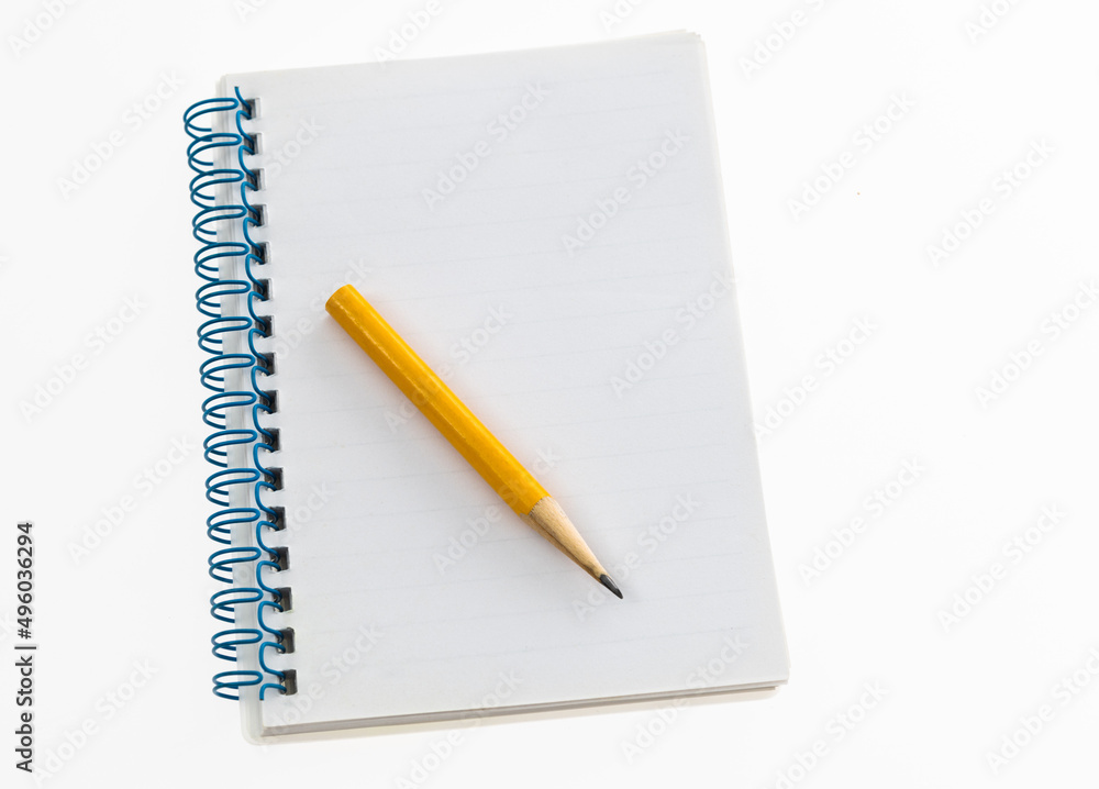 Pencil and notebook on white background Pencil and notebook on white background