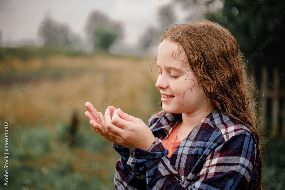 Child playing on the rain. Child playing on the rain.