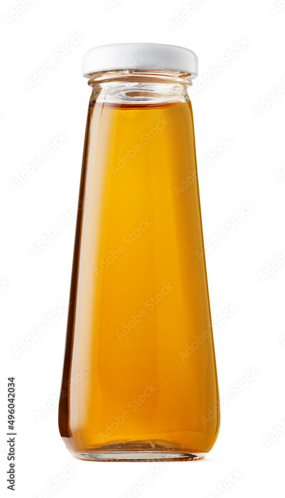 Small bottle of apple juice isolated on white. Small bottle of apple juice isolated on white.