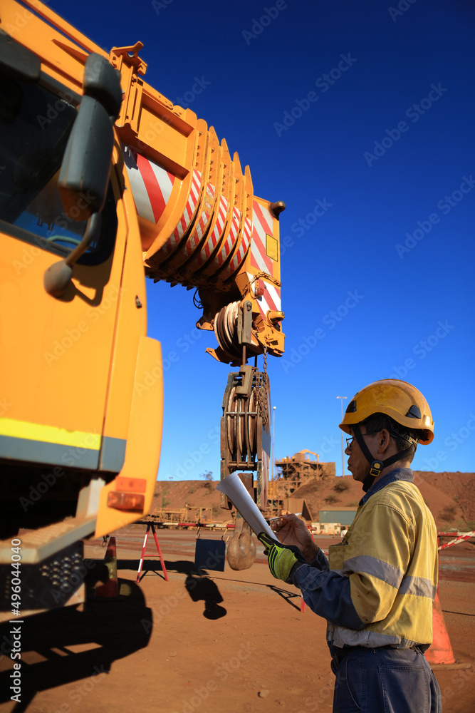 Asian rigger high risk worker wearing helmet glove inspector conducting ...
