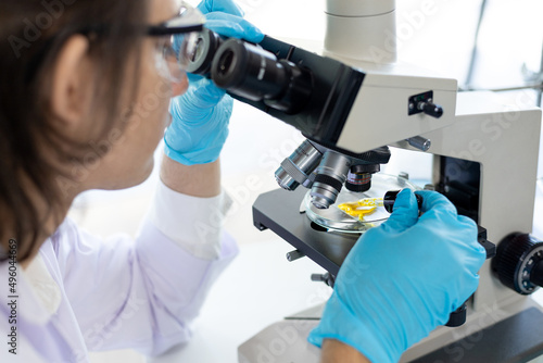 Scientists or researchers perform microscopic endoscopy to examine changes in the chemical reactions and degradation of cells, Lab experiments, Researchers scientist working analysis with test tube.